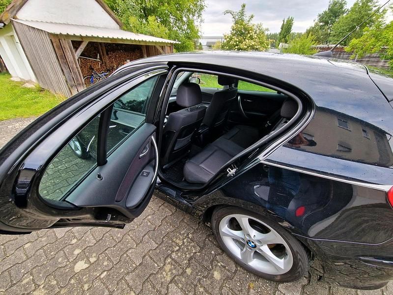 Gebraucht BMW 116 120 PS (88 kW) 2010 Schwarz Kleinwagen