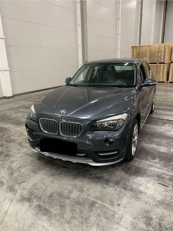 Grau Gebraucht 2015 BMW X1 Sport Line SUV | 11.600 € (Superpreis) - Bild 1/4