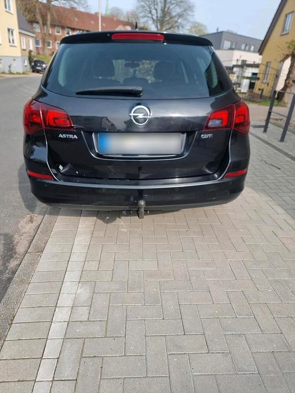 Gebraucht Opel Astra 130 PS (95 kW) 2012 Schwarz Kombi
