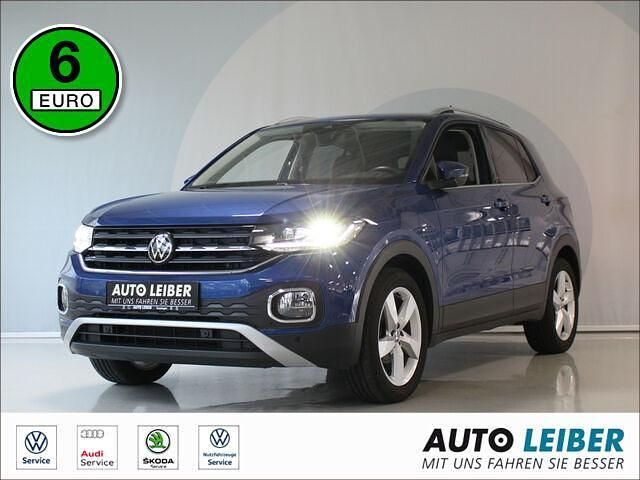 Reef blue metallic (metallic) Gebraucht 2021 VW T-Cross Style SUV | 20.990 € (Etwas zu teuer) - Bild 1/2