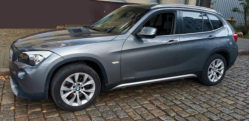 Grau Gebraucht 2012 BMW X1 Sport Line SUV | 8.499 € (Superpreis) - Bild 1/4