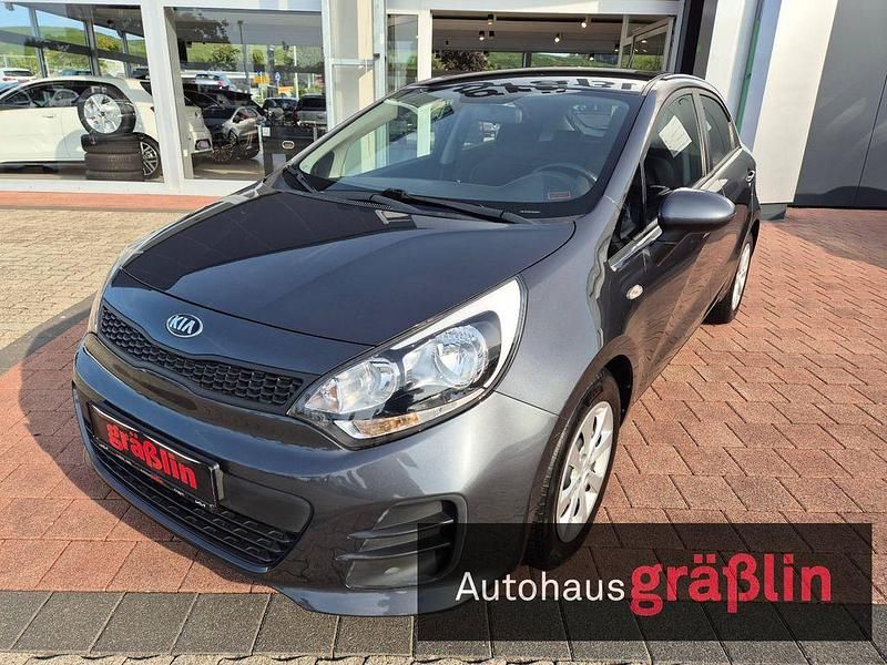 Grau Gebraucht 2017 Kia Rio Limousine | 6.800 € (Fairer Preis) - Bild 1/3