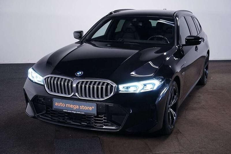 Black metallic Gebraucht 2023 BMW 330e M Sport Kombi | 38.499 € (Guter Preis) - Bild 1/4