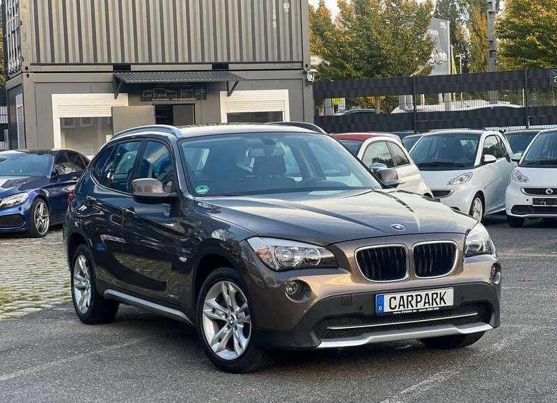 Sparkling bronze metallic Gebraucht 2011 BMW X1 SUV | 14.999 € (Fairer Preis) - Bild 1/4