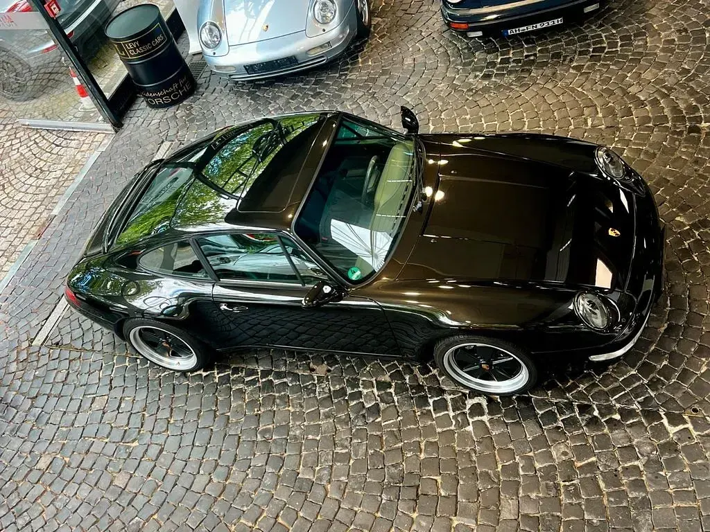 Gebraucht Porsche 911 Carrera 272 PS (200 kW) 1995 Schwarzmetallic Coupé