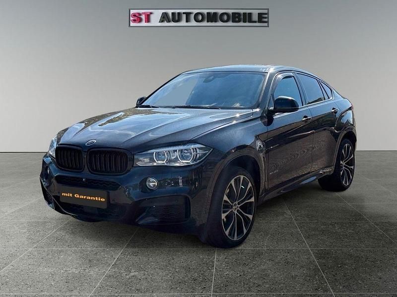 Azuritschwarz metallic Gebraucht 2018 BMW X6 M Sport SUV | 29.990 € (Teuer) - Bild 1/4