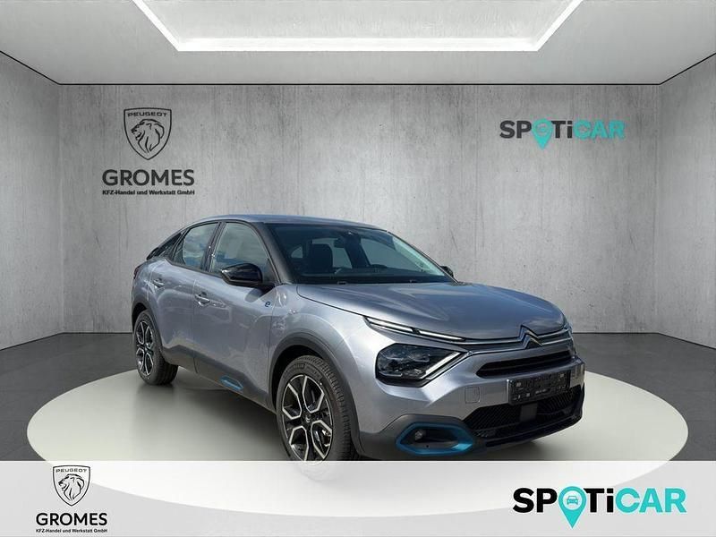 Grau Gebraucht 2023 Citroën e-C4 Feel Limousine | 19.900 € (Superpreis) - Bild 1/4