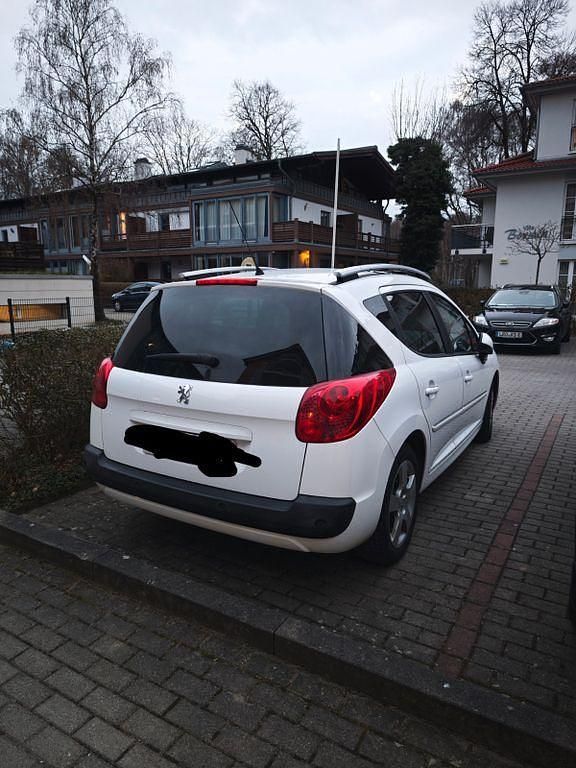 Gebraucht Peugeot 207 Premium 92 PS (67 kW) 2012 Weiß Kombi