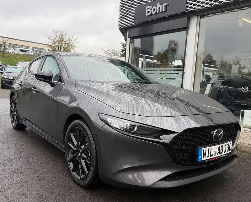 Grau Gebraucht 2025 Mazda 3 Homura-Line Limousine | 23.880 € (Superpreis) - Bild 1/4