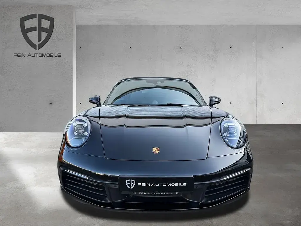 Gebraucht Porsche 911 Carrera Cabriolet 385 PS (283 kW) 2023 Tiefschwarz Cabrio