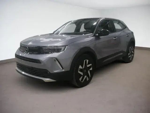 Ikone grün Gebraucht 2023 Opel Mokka-e SUV | 24.900 € (Teuer) - Bild 1/2