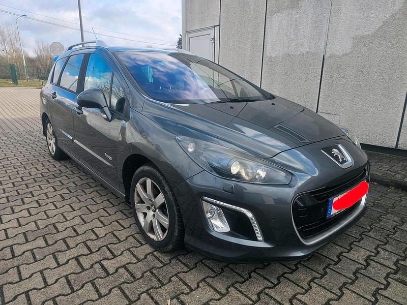 Gebraucht Peugeot 308 114 PS (83 kW) 2013 Grau Kombi