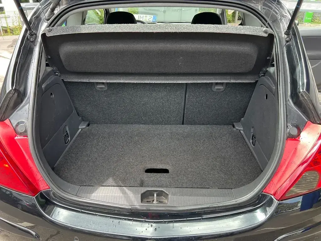 Gebraucht Opel Corsa Active 87 PS (63 kW) 2013 Schwarz Kleinwagen