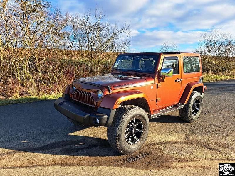 Bronze Gebraucht 2014 Jeep Wrangler Sahara SUV | 34.800 € (Etwas zu teuer) - Bild 1/4