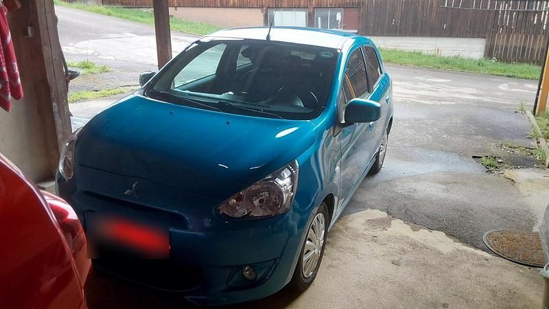 Second-hand Mitsubishi Space Star 80 CP (58 kW) 2013 Albastru Monovolum