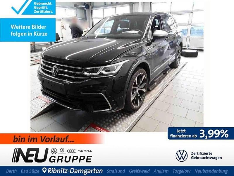Deep black (metallic) Gebraucht 2022 VW Tiguan Allspace R-line SUV | 38.779 € (Fairer Preis) - Bild 1/4