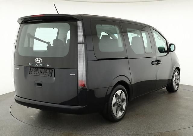 Moonlight blue / mic moonlight blue / mic Gebraucht 2022 Hyundai Staria Premium Van / Kleinbus | 40.355 € (Fairer Preis) - Bild 1/4