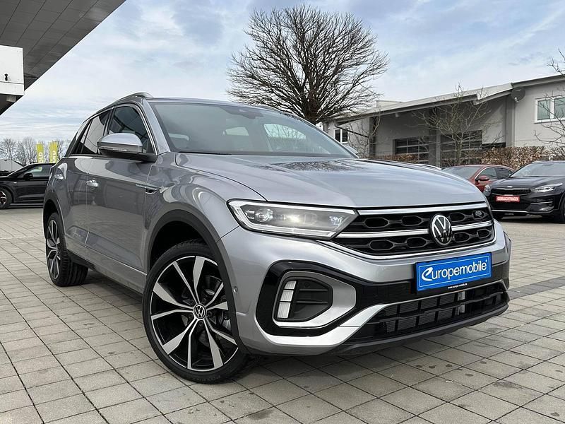Pyrit silber metallic/silber Gebraucht 2023 VW T-Roc Pro SUV | 26.100 € (Guter Preis) - Bild 1/4