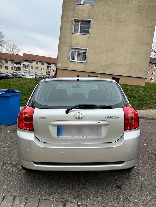 Usado Toyota Corolla 110 HP (80 kW) 2006 Cinzento Citadino