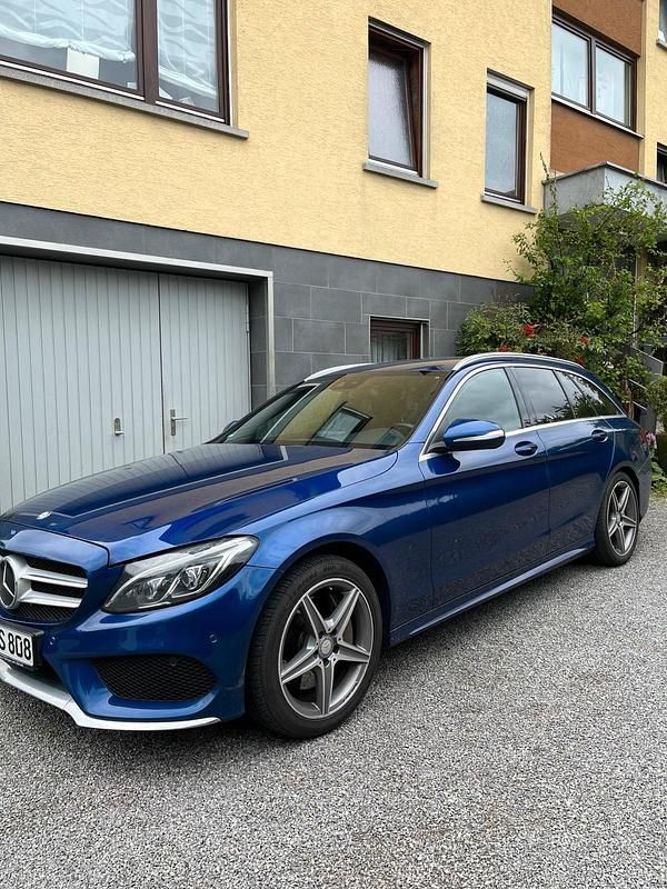 Blau Gebraucht 2015 Mercedes C250 AMG line Kombi | 16.500 € (Fairer Preis) - Bild 1/4