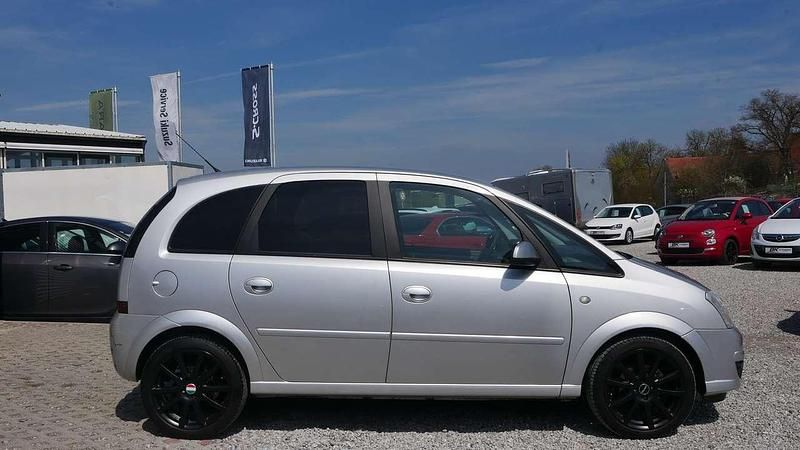 Second-hand Opel Meriva 90 CP (66 kW) 2010 Argintiu Monovolum