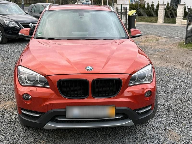 Second-hand BMW X1 177 CP (130 kW) 2012 Portocaliu SUV