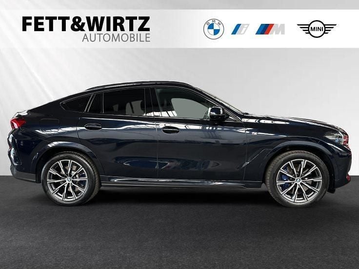 Carbonschwarz metallic Gebraucht 2022 BMW X6 M Sport SUV | 59.790 € (Superpreis) - Bild 1/3