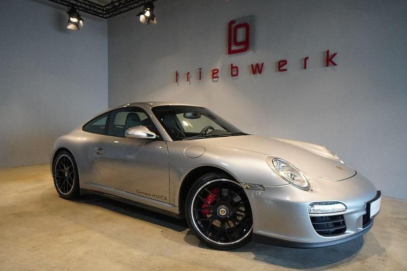 Grau Gebraucht 2012 Porsche 911 Carrera 4 Coupé | 104.941 € - Bild 1/3