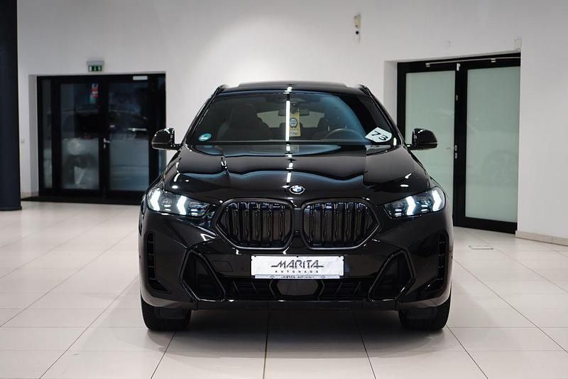 Schwarz Gebraucht 2024 BMW X6 M Sport SUV | 87.349 € (Etwas zu teuer) - Bild 1/4