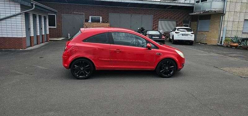 Gebraucht Opel Corsa 80 PS (58 kW) 2007 Magma rot (b) Kleinwagen