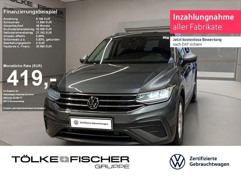 Platinum grey (metallic) Gebraucht 2022 VW Tiguan Allspace Life SUV | 32.889 € (Fairer Preis) - Bild 1/4