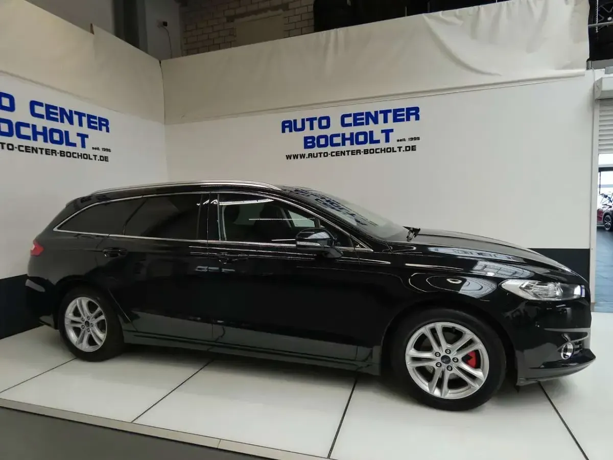 Gebraucht Ford Mondeo Titanium 150 PS (110 kW) 2016 Iridiumschwarz metallic Kombi