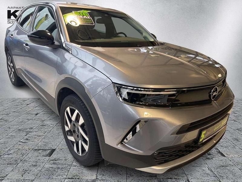 Gebraucht Opel Mokka-e Elegance 100 kW (136 PS) 2022 Kontrast grau/quarz silber SUV