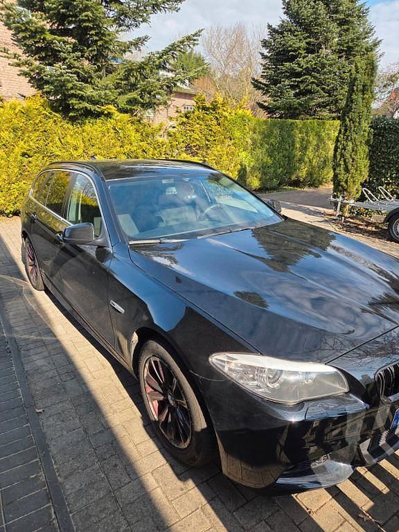 Gebraucht BMW 520 184 PS (135 kW) 2011 Schwarz Kombi
