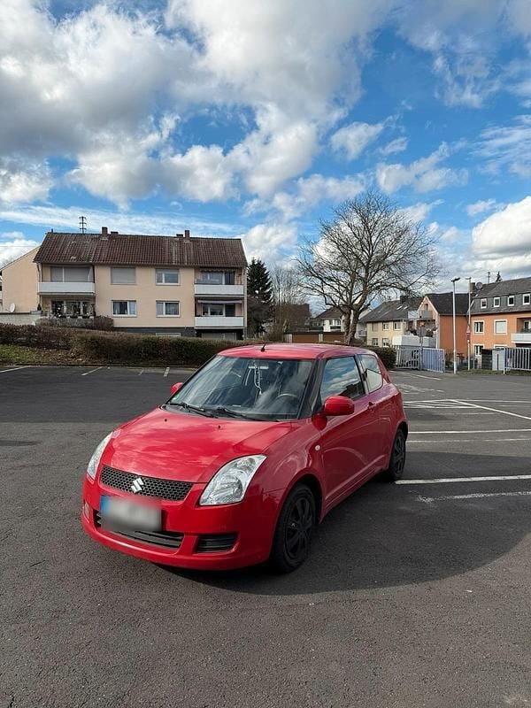 Second-hand Suzuki Swift 92 CP (67 kW) 2009 Roșu Hatchback