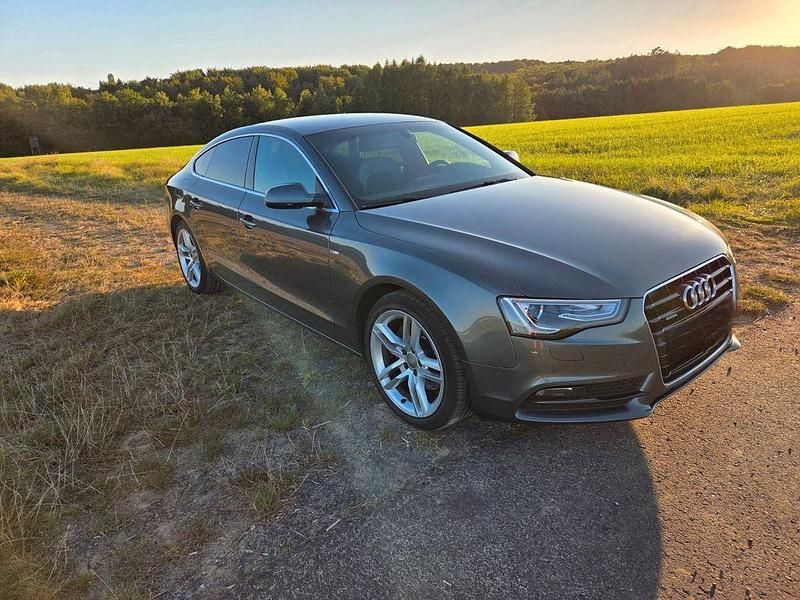 Grau Gebraucht 2012 Audi A5 Sportback Comfort Limousine | 12.000 € (Fairer Preis) - Bild 1/4