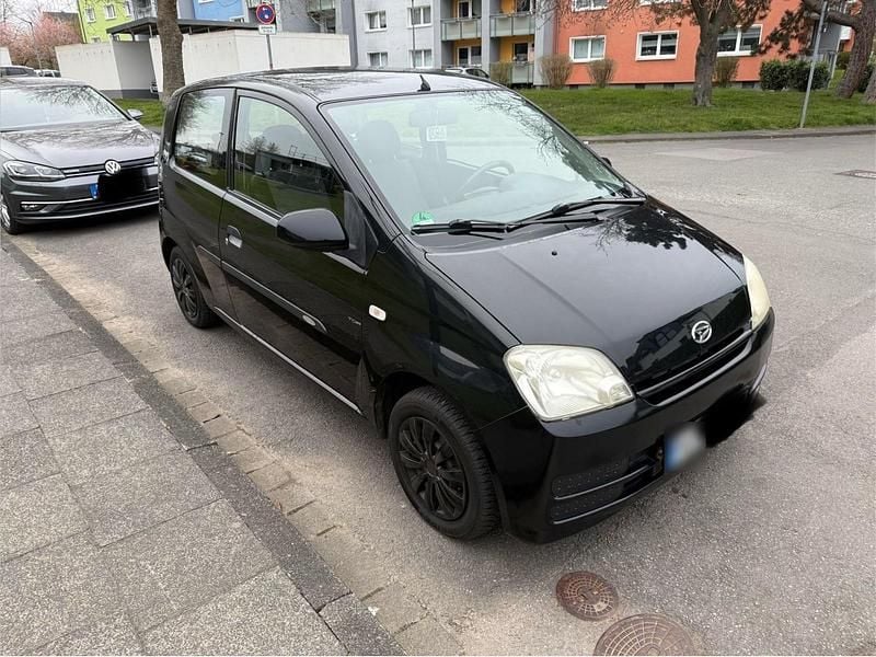 Gebraucht Daihatsu Cuore 58 PS (42 kW) 2006 Schwarz Kleinwagen