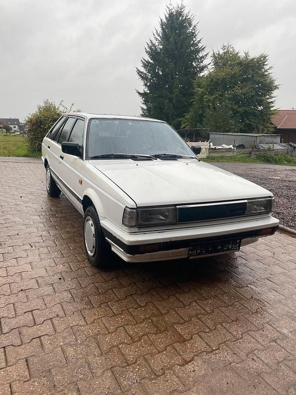 Weiß Gebraucht 1987 Nissan Sunny Coupé | 950 € - Bild 1/4