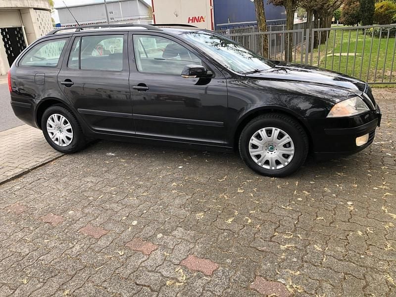 Second-hand Skoda Octavia 160 CP (117 kW) 2010 Negru Break