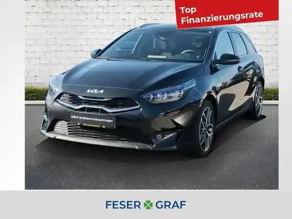 Zilinaschwarz met Gebraucht 2024 Kia Ceed Kombi | 19.990 € (Superpreis) - Bild 1/4