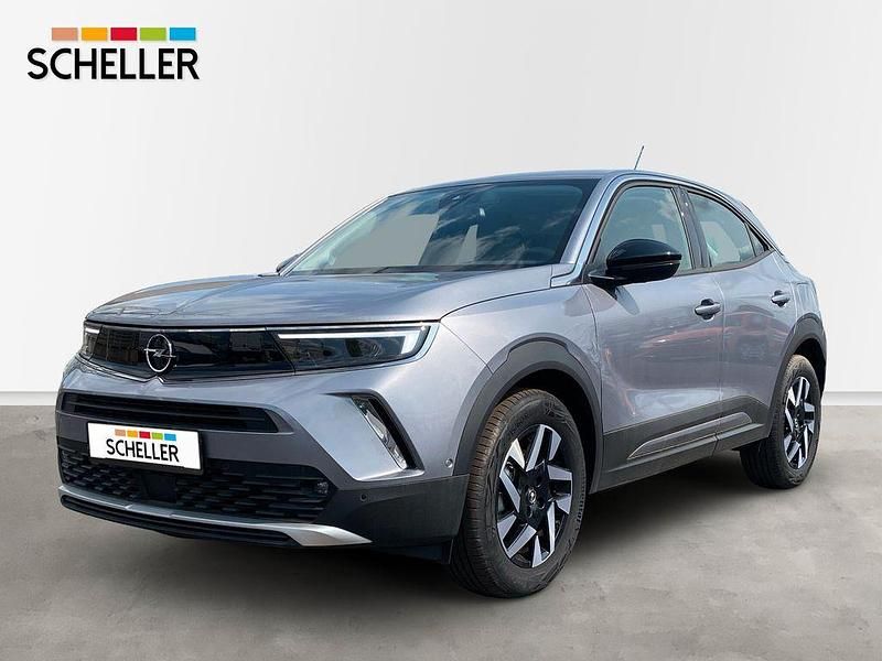 Grau Gebraucht 2024 Opel Mokka-e Elegance SUV | 33.332 € - Bild 1/4