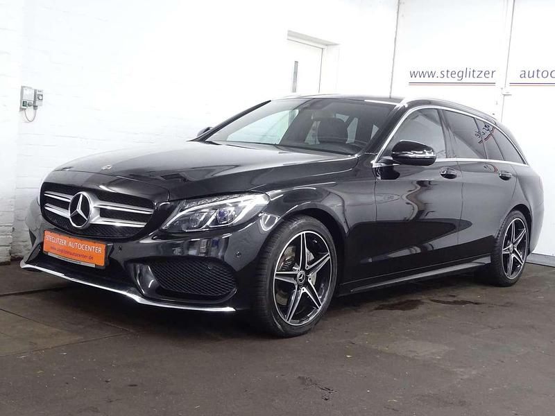Ung. schwarz unilack Gebraucht 2018 Mercedes C200 AMG line Kombi | 22.900 € (Fairer Preis) - Bild 1/4