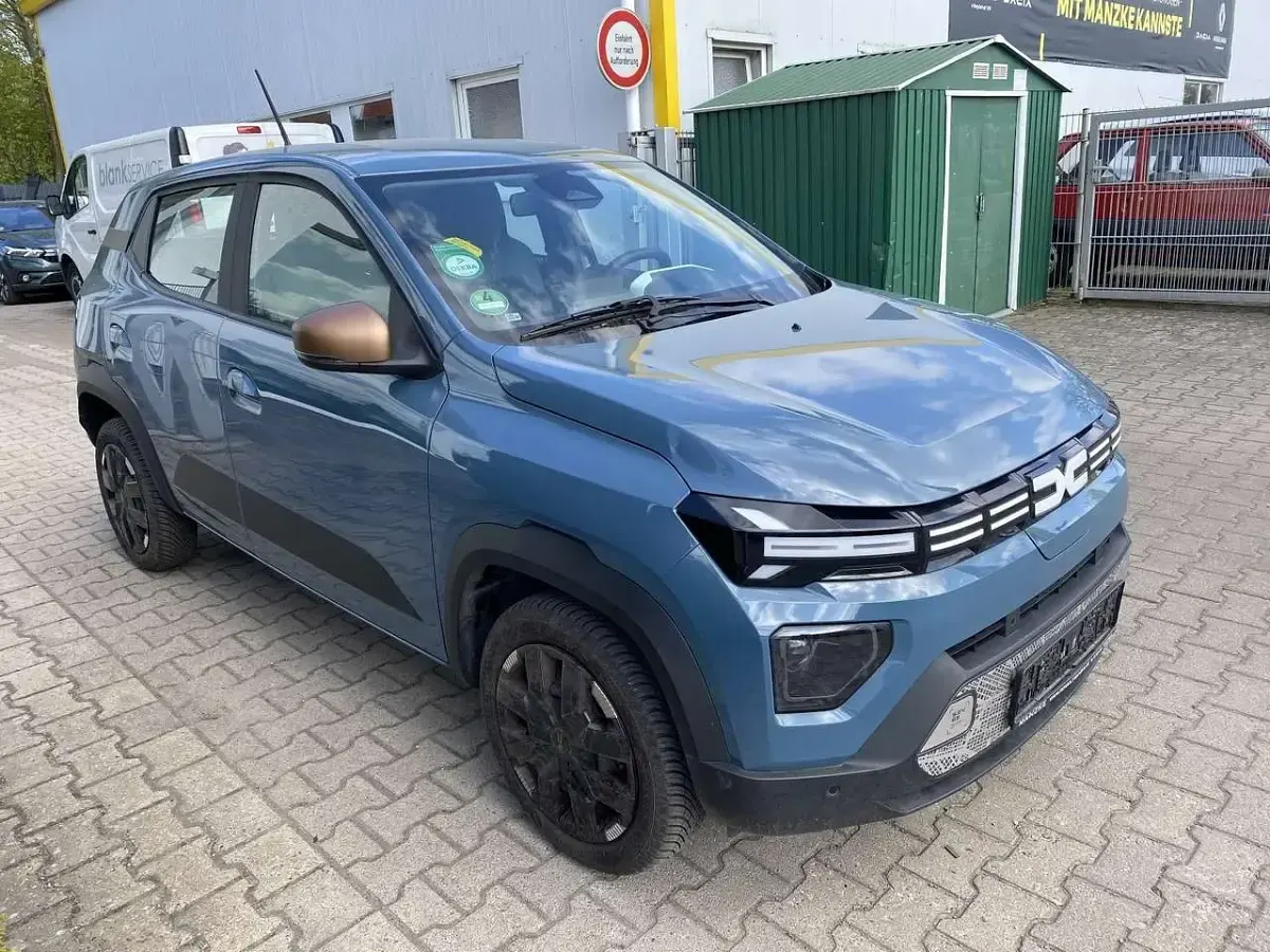 Gebraucht Dacia Spring Extreme 47 kW (65 PS) 2025 Schieferblau Kleinwagen