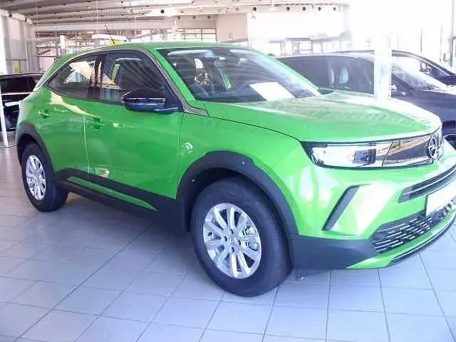 Grün (ikone grün) Gebraucht 2024 Opel Mokka Enjoy SUV | 19.990 € (Guter Preis) - Bild 1/4