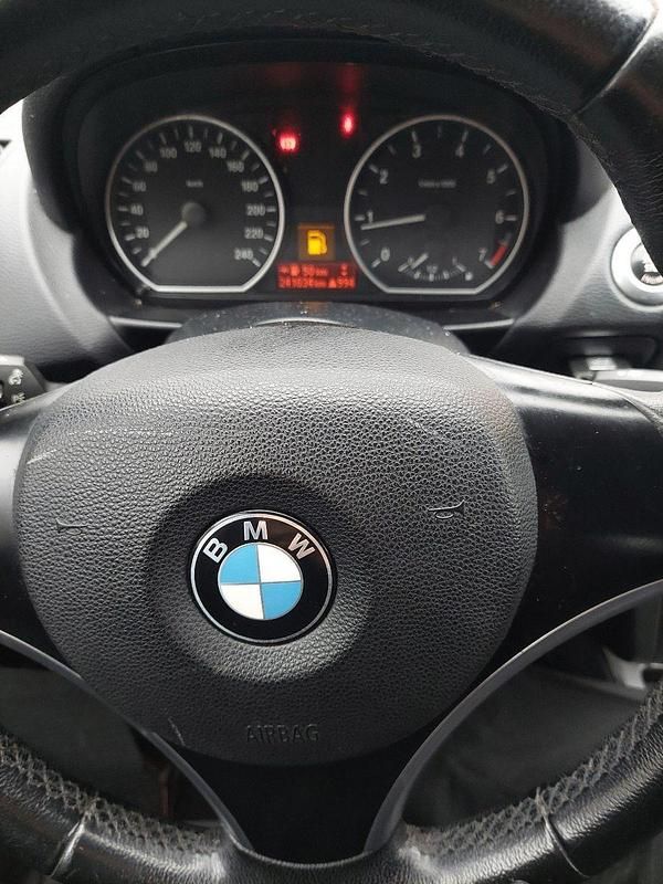 Gebraucht BMW 116 122 PS (89 kW) 2008 Schwarz Kleinwagen