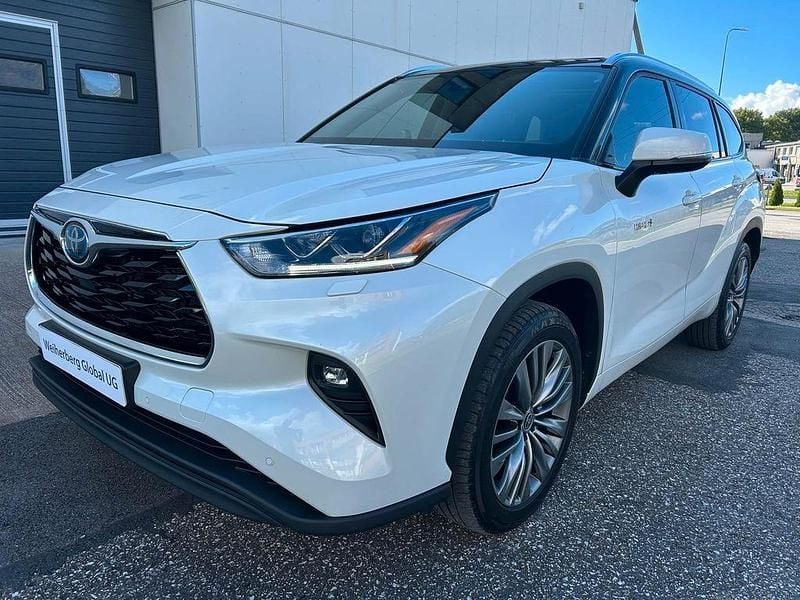 Weiß Gebraucht 2021 Toyota Highlander Hybrid Executive SUV | 46.900 € - Bild 1/4