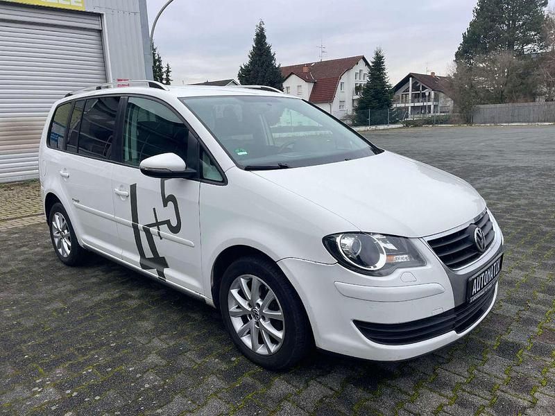 Weiß Gebraucht 2010 VW Touran Freestyle Van / Kleinbus | 3.690 € (Superpreis) - Bild 1/4