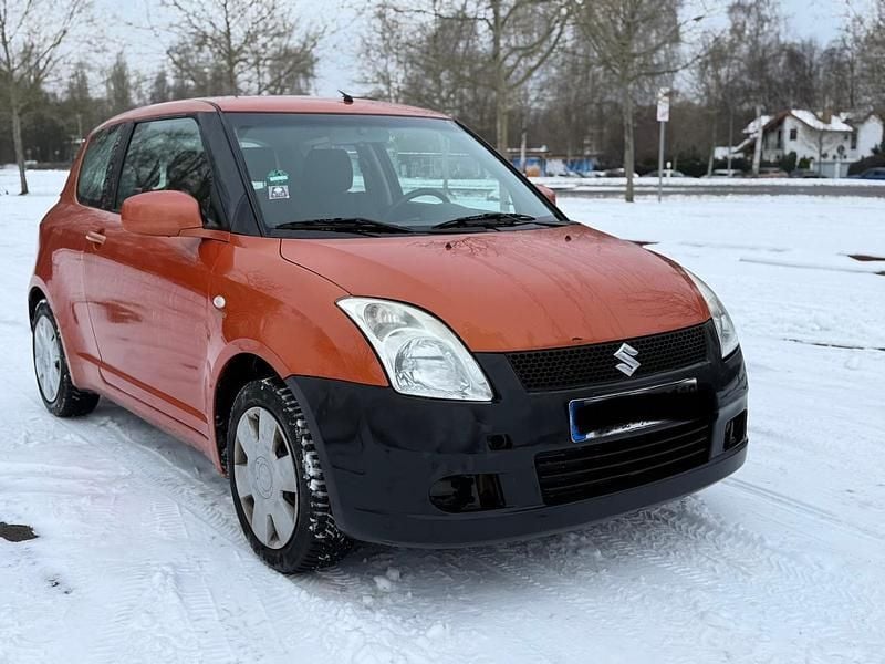 Orange Gebraucht 2006 Suzuki Swift Kleinwagen | 550 € (Superpreis) - Bild 1/4