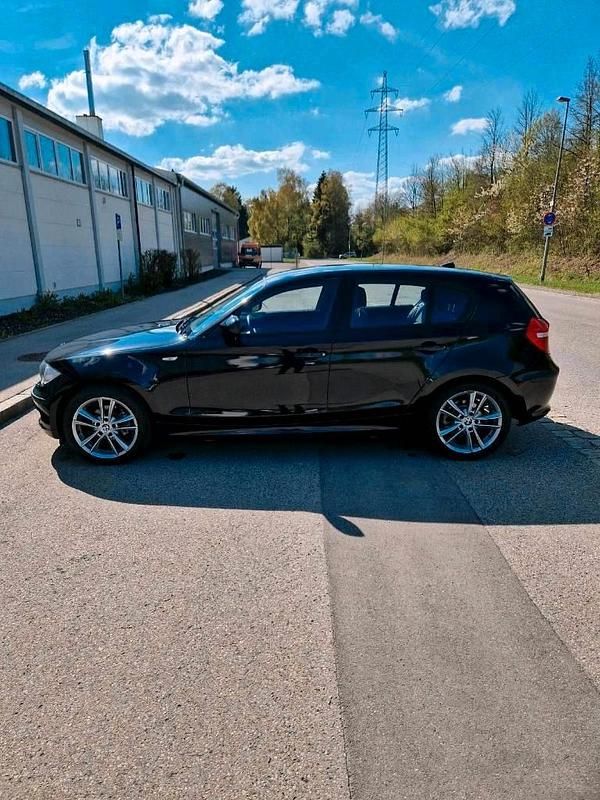 Second-hand BMW 116 122 CP (89 kW) 2010 Negru Hatchback