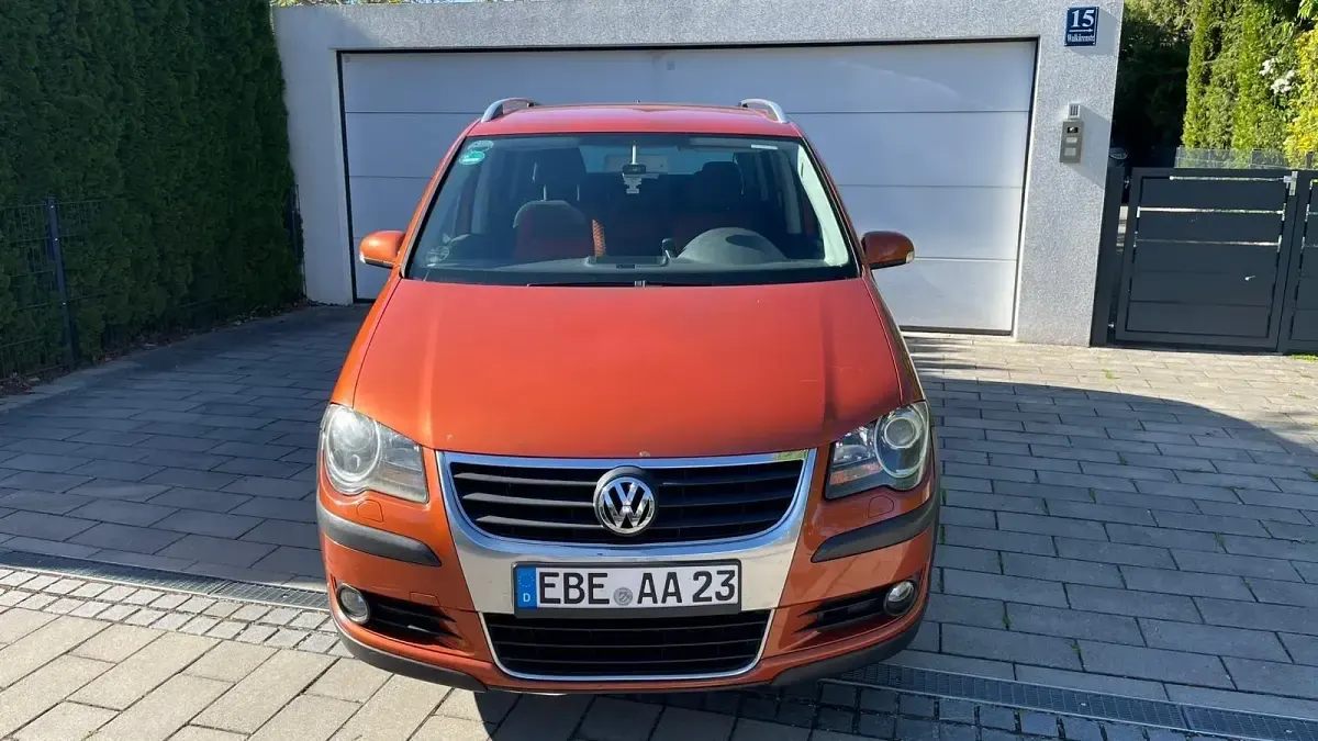 Używany VW Touran Cross 170 KM (125 kW) 2007 Pomarańczowy Minivan